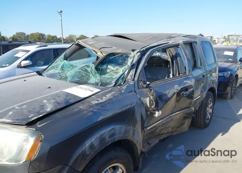 2011 Honda Pilot Touring из США, поврежденный, VIN 5FNYF3H92BB036010